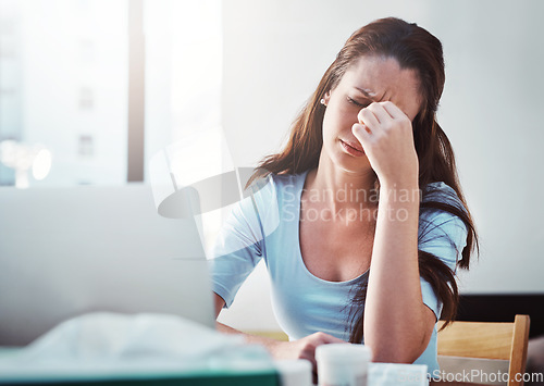 Image of Stress, remote work and woman with a migraine working on freelance project with laptop at home. Burnout, fatigue and sick female freelancer with headache in pain doing research at a desk or workspace