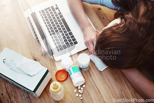 Image of Sleeping, sick and woman with laptop and pills, flu and burnout in the workplace, medicine and tired. Female person, employee and illness with technology, medication and sleeping with telehealth