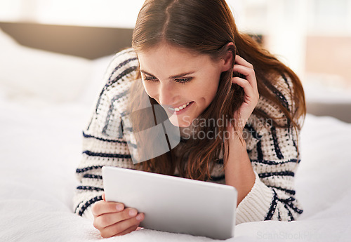 Image of Relax, happy and tablet with woman on bed for social media, communication and digital. Internet, technology and website with female person reading online at home for ebook, streaming and happiness