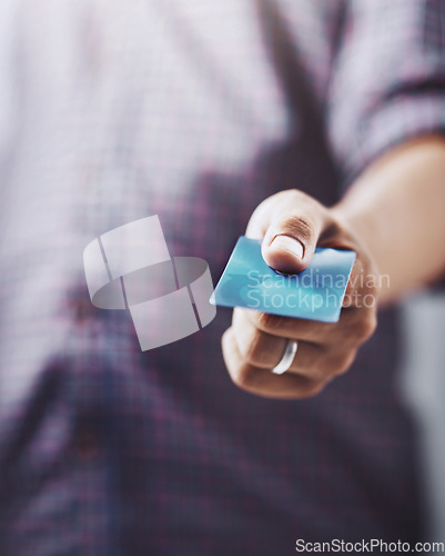 Image of Man, hand and credit card for ecommerce, payment or checkout and purchase at retail store. Closeup of male person, hands or customer showing debit for online shopping, transaction or banking to pay