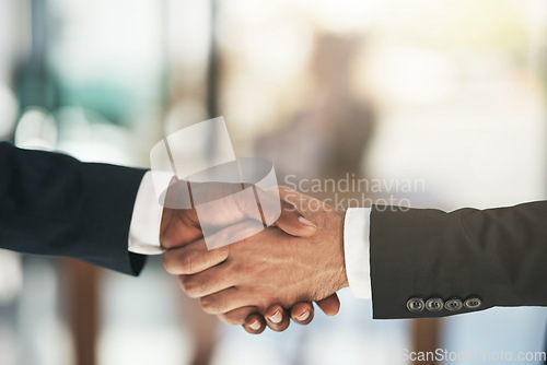 Image of Handshake, partnership and b2b with business people in the office for an agreement or deal together. Thank you, interview and welcome with corporate men shaking hands for greeting during a meeting