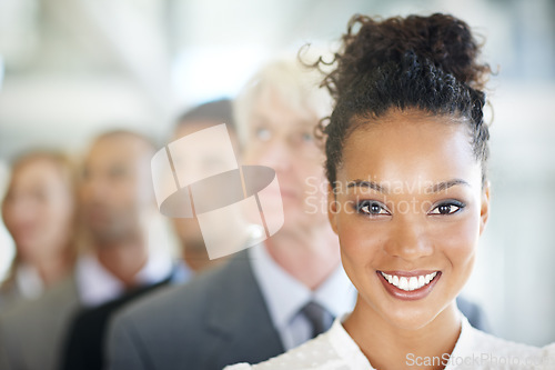 Image of Happy business woman, portrait and leadership in management, teamwork or diversity at office. Face of corporate female leader smiling with diverse group, team or unity for company vision or growth