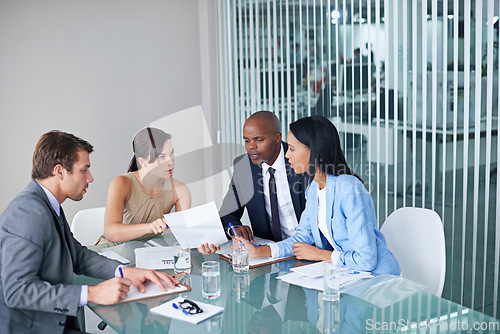 Image of Teamwork, documents and business people in meeting in the office planning corporate project. Discussion, paperwork and professional employees working in collaboration in the workplace conference room