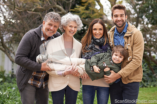 Image of Happy family, portrait and grandparents with parents and child in a park on outdoor vacation or holiday. Face of mother, happiness and father play with kid as love, care and together in nature