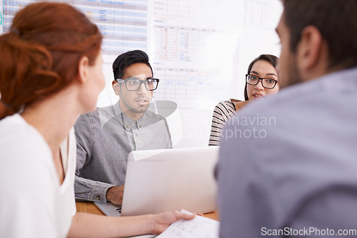 Image of People in creative meeting, brainstorming and team in conference room with laptop. Plan, collaboration with men and women in strategy discussion at digital marketing startup, productivity and ideas