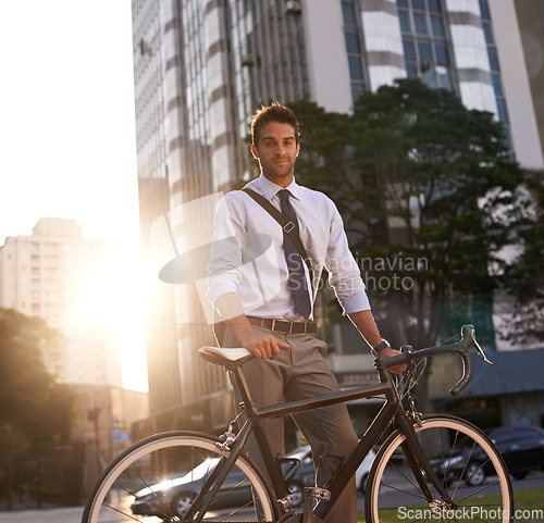 Image of Cycling, portrait and business man in city for commute, carbon neutral and transportation. Sustainable, professional and travel with male employee walking with bike in urban town for journey and trip