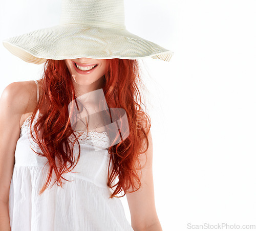 Image of Happy woman, fashion and hiding with hat in studio, white background and isolated mockup. Hidden face, mystery style and female model smile with red hair, cool summer accessory and elegant beauty