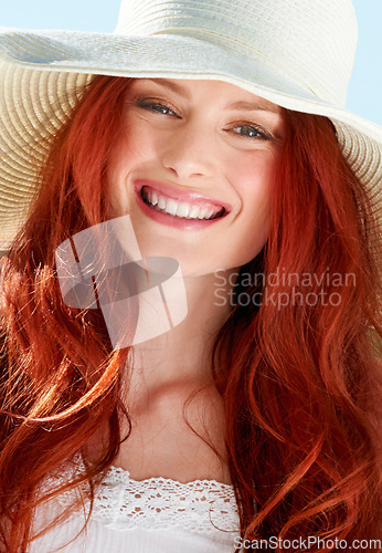 Image of Happy woman, portrait and face with straw hat for summer vacation, confident style and sunny holiday. Female person, red hair and smile with fashion accessory, freedom and happiness to relax outdoor