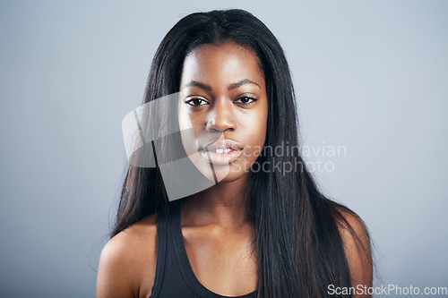 Image of Model headshot, portrait and a confident black woman isolated on a studio background. Jamaica, posing and a young African girl with long hair for modeling profile with confidence on a backdrop