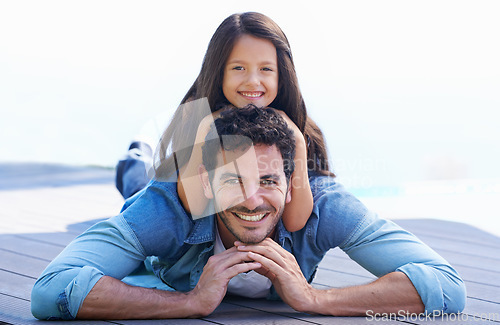 Image of Love, relax and floor portrait of happy family father, child or people smile for Fathers day quality time together. Support trust, childhood and young kid, girl or youth bonding with dad, papa or man