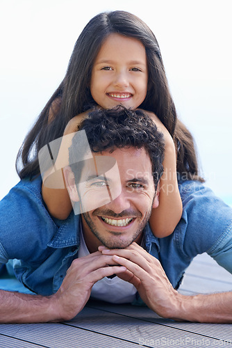 Image of Relax, floor and face portrait of happy family father, child or people smile for Fathers day, parenthood or wellness. Support trust, childhood and young kid, girl or youth bonding with dad on ground