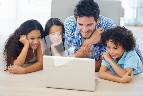 Image of Laptop, relax on floor and dad and children watching social media video, online website or family movies. Adoption, bonding and happy family kids with father streaming home broadcast film on pc