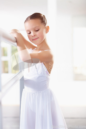 Image of Young girl, ballerina and ballet class with kid dancer at academy, practice dancing at studio. Female child learning to dance in lesson, creativity with fitness and training, focus and concentration