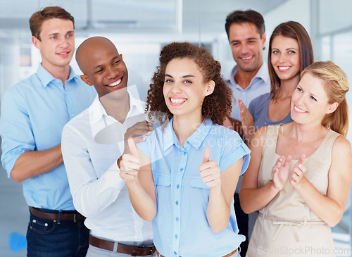 Image of Business people, portrait smile and thumbs up for success, promotion or winning at office. Group of employees in celebration applause showing thumb emoji, yes sign or like for teamwork at workplace