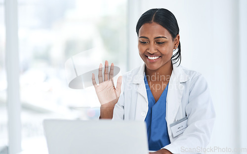 Image of Hand, hello and woman doctor on laptop video call for online consulting, help and advice in a hospital. Telehealth, hi and female healthcare expert on virtual consult or medical conference on space