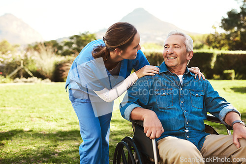 Image of Senior man, nurse and wheelchair for support, healthcare or garden at nursing home. Happy elderly male and woman caregiver in care for patient or person with a disability for life insurance in nature