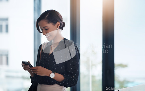 Image of Business, smile or woman with a cellphone, connection or typing with social media, texting or sms in a workplace. Female person, employee or entrepreneur with a smartphone or search internet for info