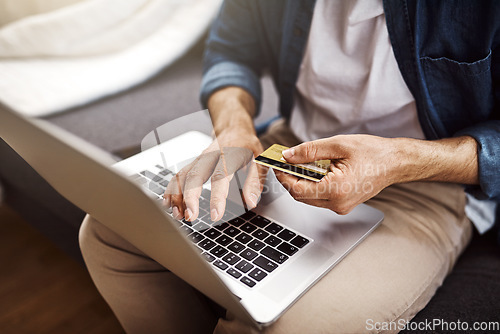 Image of Hands, laptop and credit card for man, payment and online shopping with cybersecurity, tech and typing. Guy, computer and fintech on internet store for discount, sale and deal with banking password