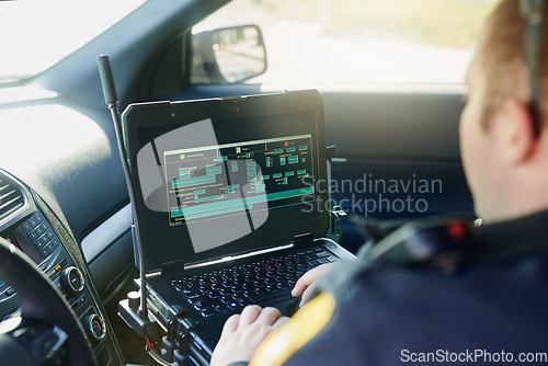 Image of Database, laptop and a police officer in a car for security, urban law and safety data while working. Screen, programming and male protection professional with a computer to hack system in transport