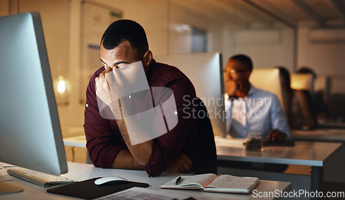 Image of Employee, night and man with a headache, burnout and depression with a deadline, tired and mistake. Male person, employee and consultant with a migraine, working late and depression with health issue