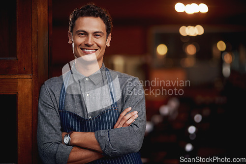 Image of Portrait, man and small business owner of cafe, restaurant or pub with a smile for career pride. Male entrepreneur person as manager, barista and waiter or bartender at door for shop welcome greeting