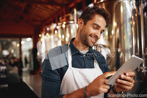 Image of Tablet, beer and smile with man in factory for production, manufacturing and alcohol fermentation. Technology, inspection and digital with business owner for distillery, storage and quality control