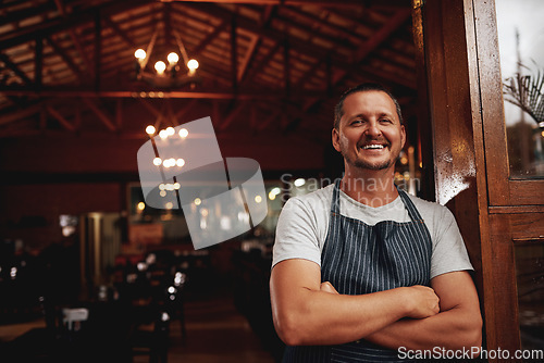 Image of Happy man, portrait and small business owner of restaurant, cafe or pub with a smile for career pride. Male entrepreneur person as manager, barista and waiter at door for shop welcome greeting