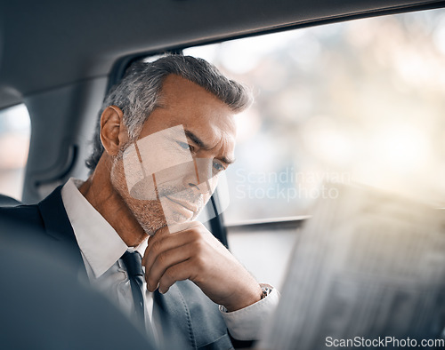 Image of Man, reading newspaper and car for business travel, journey or drive while thinking of news. Professional male person with media paper in passenger seat for work with luxury transportation or a taxi