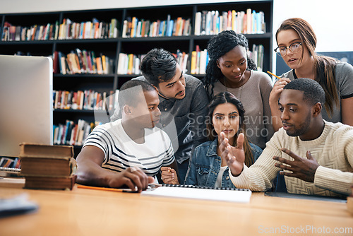 Image of Students in library, studying together and discussion, exam or research for project, education and teamwork. Diversity, young men and women in study group and learning with collaboration on campus