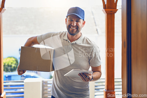 Image of Happy delivery man, box and portrait with tablet for order, parcel or courier service at front door. Male person smiling with package, carrier or cargo for online purchase, transport and supply chain