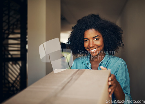 Image of African woman, front door and box for delivery, e commerce or service in portrait with smile at house. Girl, package and happy for supply chain, customer experience and cargo for mail at apartment