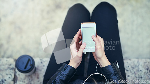 Image of Top view, hands and phone screen with mockup in city, internet scroll and social media outdoor. Cellphone, space and hand of woman with marketing, advertising or commercial promotion in urban street