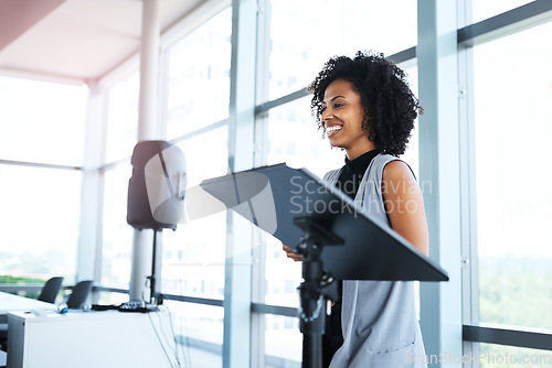 Image of Meeting, presentation and female presenter in the office boardroom for a business conference. Corporate speech, speaker and woman manager talking at a tradeshow, seminar or workshop in the workplace.