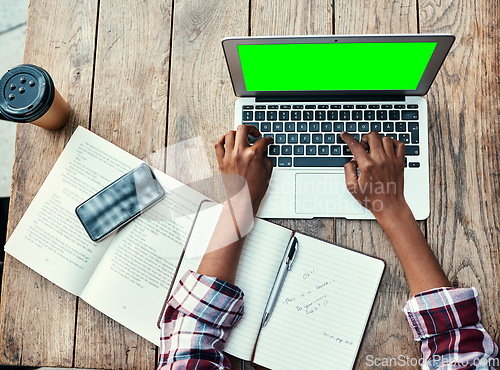 Image of Woman, hands and laptop of student on green screen mockup above for studying, education or research at cafe. Top view of female person hand on computer display for university project at coffee shop