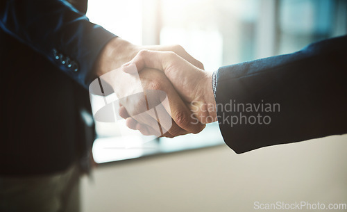 Image of Handshake, partnership and b2b with business men in the office for agreement, deal or company merger. Meeting, interview or welcome with people greeting at work in collaboration or to say thank you