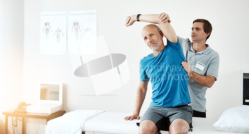 Image of Stretching, physiotherapy and a man with a doctor for rehabilitation, fitness and health support. Healthcare, sports training and a physiotherapist with a senior patient and arm stretch after injury