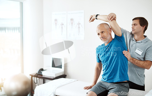 Image of Stretching, physiotherapy and a man with doctor for physical therapy, fitness and health support. Healthcare, sports training and a physiotherapist with a senior patient and arm stretch after injury