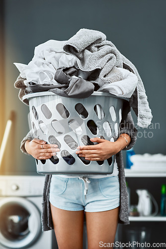 Image of Laundry, hands and woman with basket in her home for housework, washing and hygiene. House, cleaning and female carrying fresh fabric for spring clean, clothes and household task on the weekend