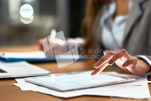 Image of Business woman, tablet and screen for planning, legal research and writing documents at night. Typing, scroll and professional person or lawyer hands on digital tech, policy paperwork and job report