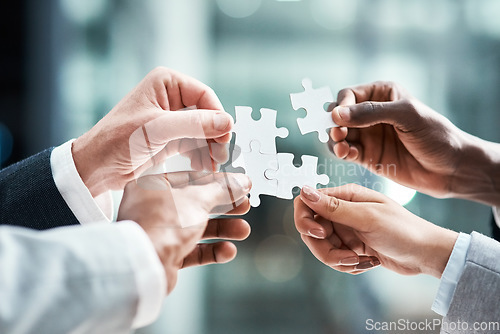 Image of Puzzle, teamwork or group of people hands for solution, business goals and integration of workflow or success. Team building, games and development of person problem solving, synergy or collaboration