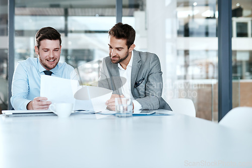 Image of Discussion, paperwork and business people in a meeting in office boardroom planning corporate strategy. Teamwork, collaboration and male employees working on project with documents with mockup space.