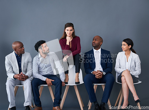 Image of Business woman, interview and people on chairs for leadership or Human Resources job. Hiring and recruitment of diversity men and women with portrait of person ready for opportunity in a waiting room