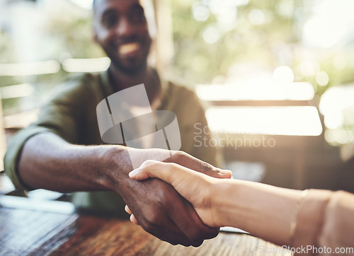 Image of Shaking hands, people and coffee shop with remote work deal and thank you hand sign. Diversity, cafe and restaurant with business partnership with meeting greeting and handshake of freelancer