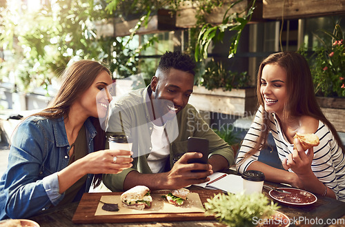 Image of Breakfast, friends and people with phone in restaurant for social media, mobile app and website. Coffee shop, communication and happy men and women on smartphone for meme, funny internet and online
