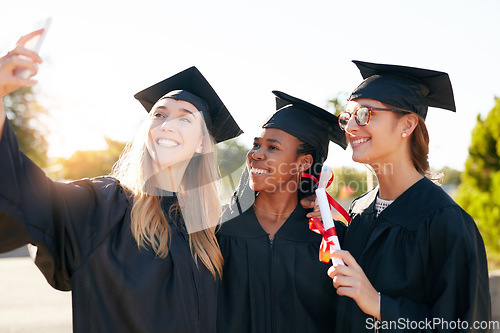 Image of Women, friends and graduation selfie for college or university students together with a smile. Happy people outdoor to celebrate education achievement, success or future at event for school graduates