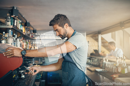 Image of Man in cafe, coffee machine and barista, prepare caffeine drink order with process and production in hospitality industry. Service, male waiter working on espresso or latter beverage in restaurant