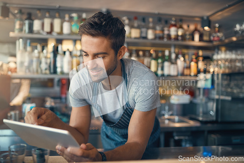 Image of Cafe, waiter and reading on digital tablet, scroll through inventory list and check stock, small business and hospitality. Man, owner and franchise with admin and stocktaking with connectivity