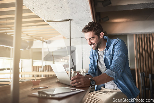 Image of Man in cafe, laptop and small business owner, entrepreneur in hospitality industry and connectivity. Happy male professional, coffee shop franchise and wireless connection with digital admin on pc