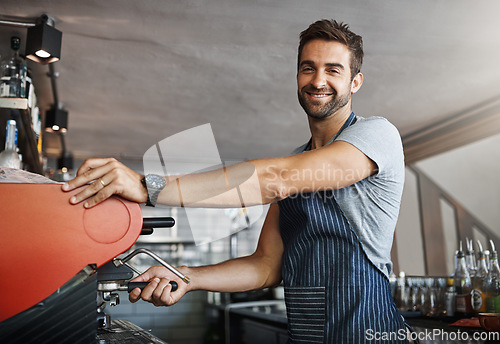 Image of Man in cafe, machine for coffee and barista, prepare caffeine drink with process and production in hospitality industry. Service, male waiter working on espresso in restaurant and smile in portrait