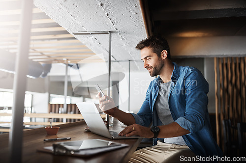 Image of Man in coffee shop, laptop and smartphone, small business and entrepreneur in hospitality industry and connect. Male owner, cafe franchise and check email or social media with digital admin on pc